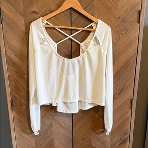 Fp movement workout top. Loose fit with cross backs and thumb holes on sleeves